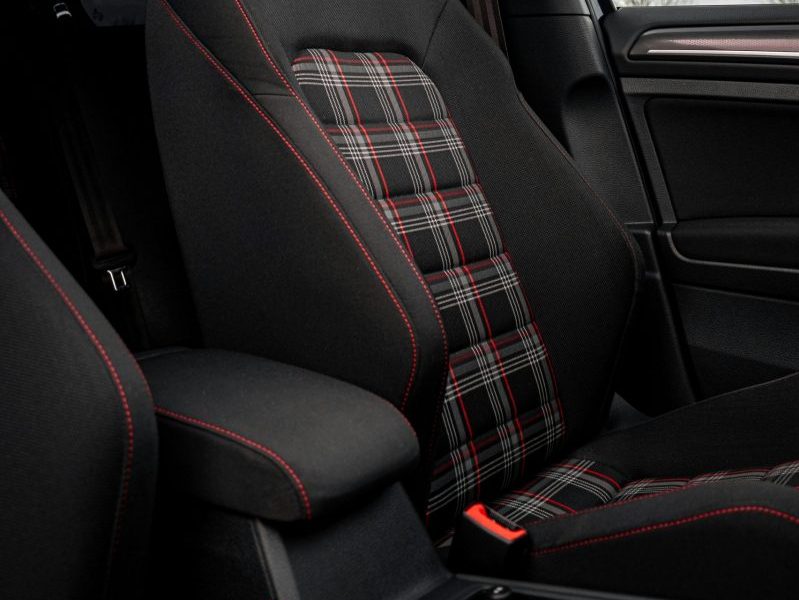 Interior of a modern car with a sunroof and plaid seat design in Totes, Normandie, France.
